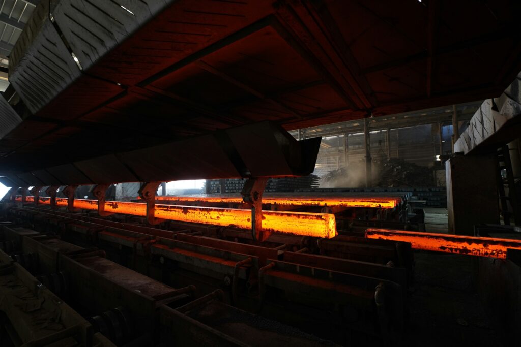 Glowing hot billets on a rolling line